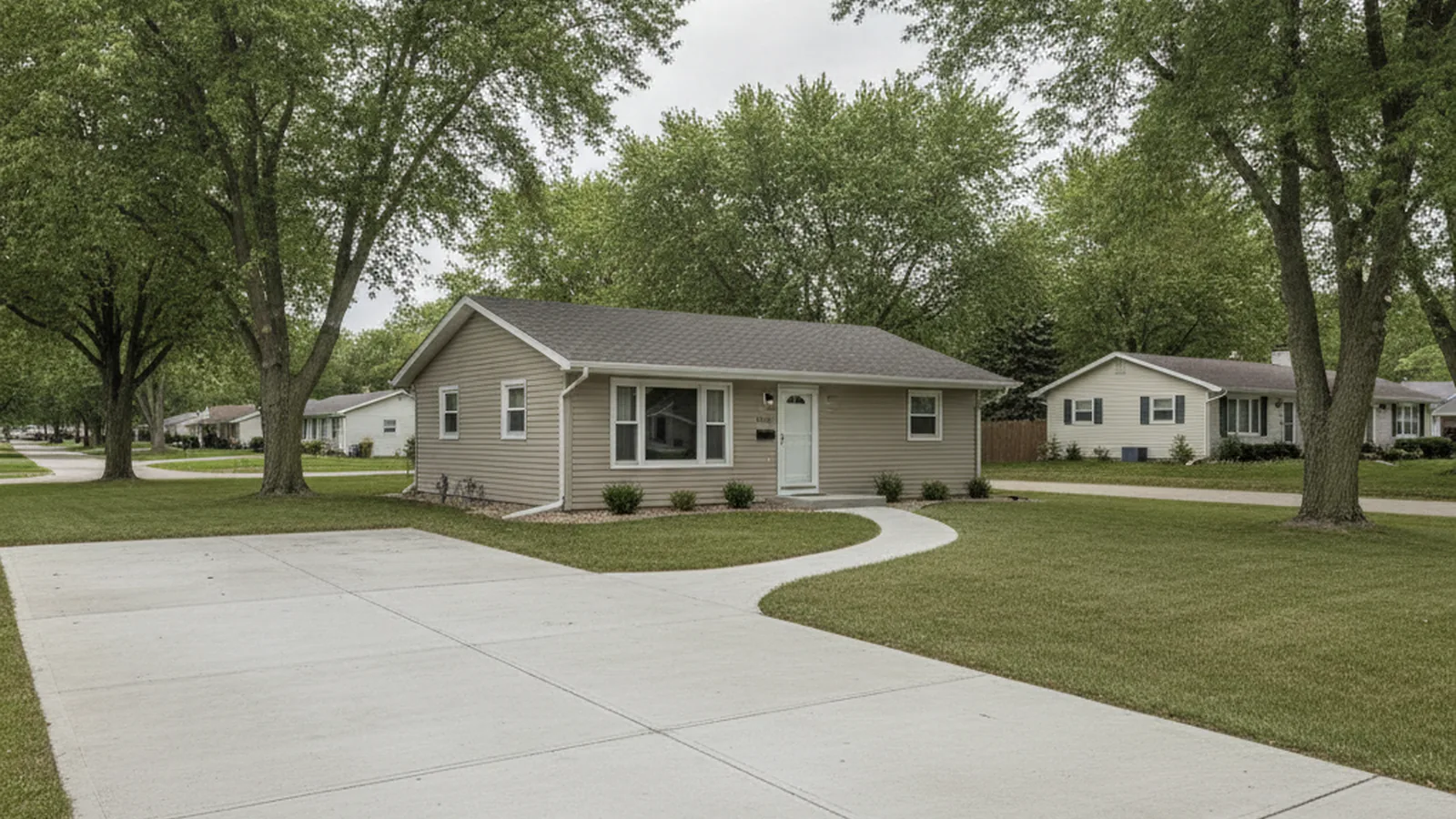 Residential concrete driveway and walkway setting